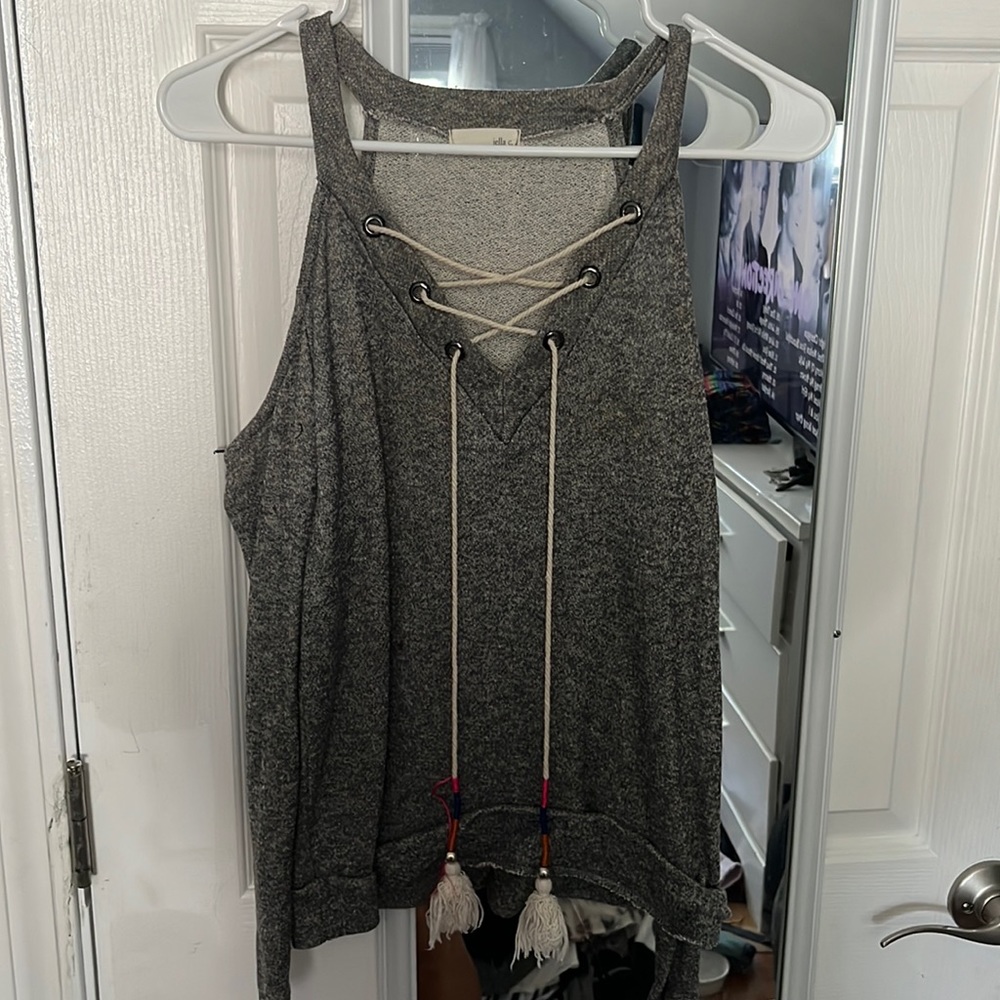 Jella C. Open shoulder sweater with cross on neck-line. Great for Fall.